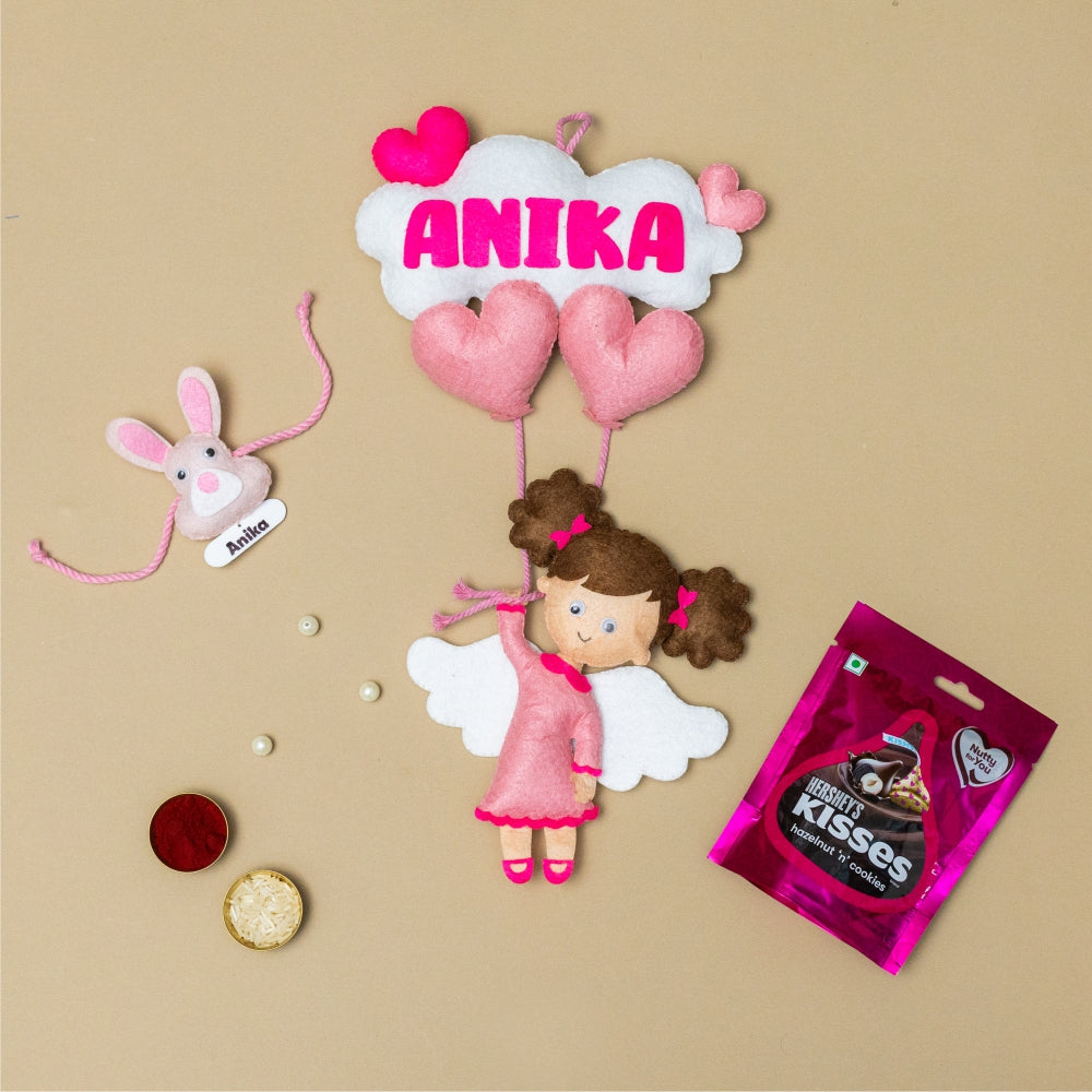 Girl Hanging with Personalised Rakhi, Chocolates, Roli and Chawal | Rakhi Hamper