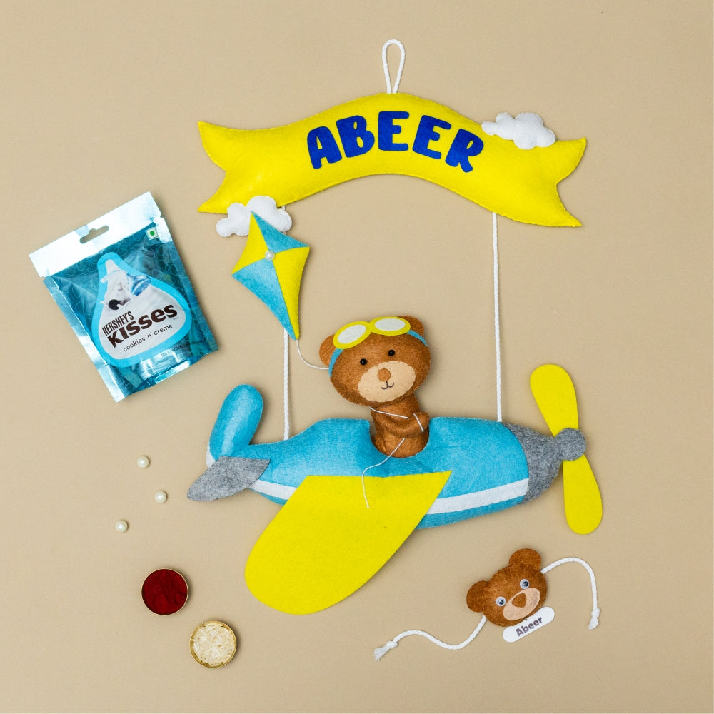 Riding Plane Blue with Personalised Rakhi, Chocolates,Roli and Chawal | Rakhi Hamper