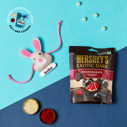Girl Hanging with Personalised Rakhi, Chocolates, Roli and Chawal | Rakhi Hamper